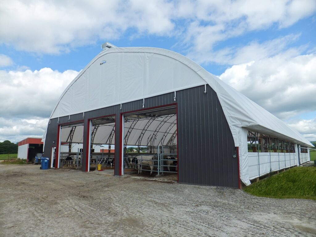 High bay storage building with multiple overhead doors